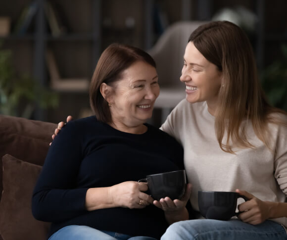 Two women sharing a cup of tea